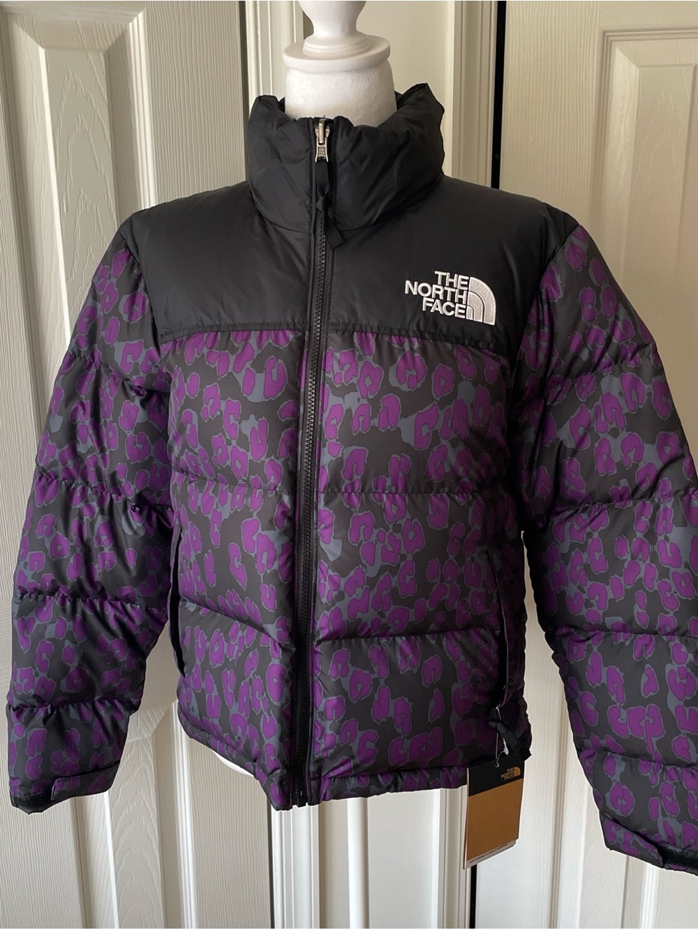 The North Face women’s Nuptse Black & Purple Leopard-Print Puffer Jacket
